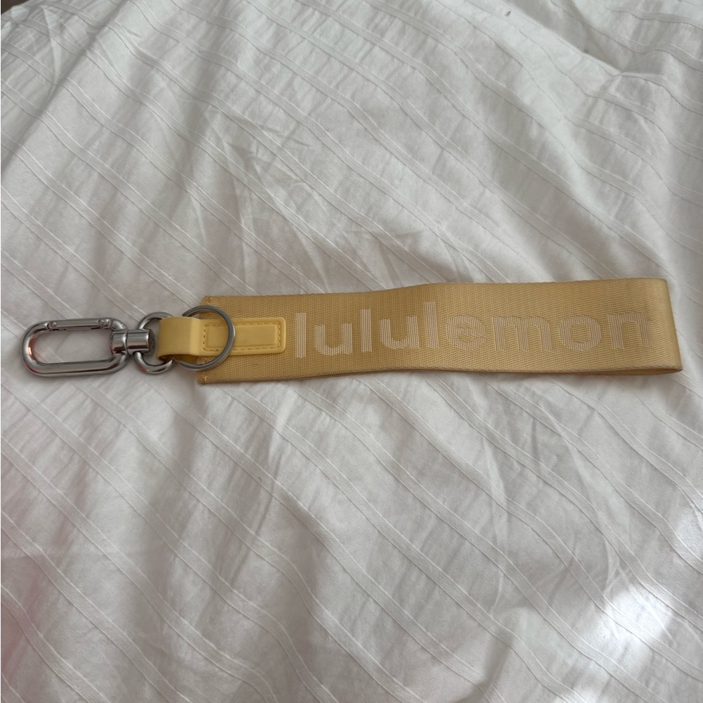Lululemon Yellow never lost keychain